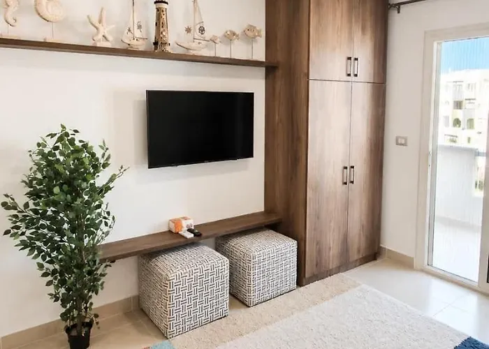Edelma Sahl Hasheesh - Modern 1br With Rooftop Pool King Bed & Fast Wifi